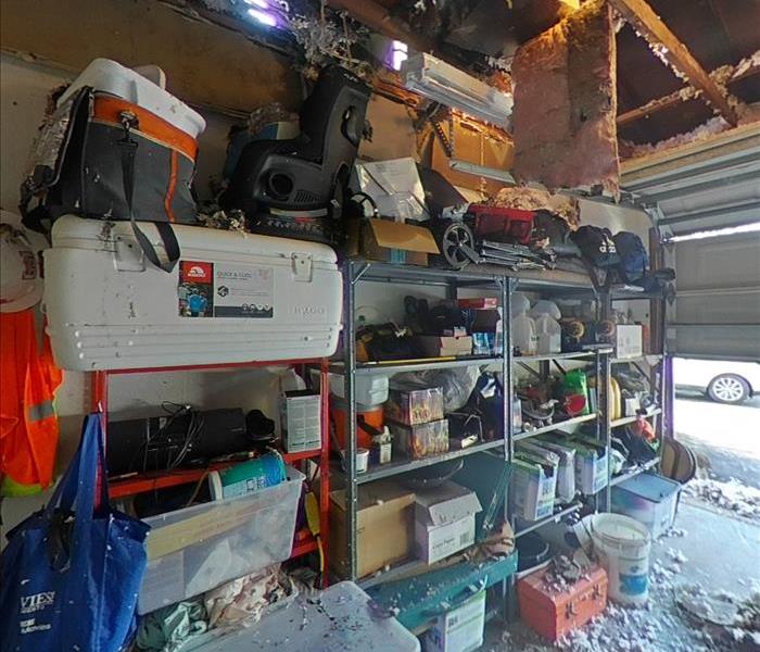 Image shows metal shelves full of dirty items