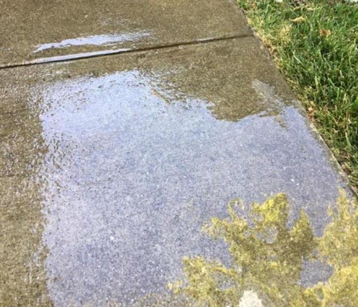 Picture shows a puddle of water